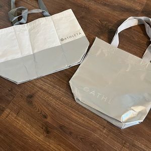2 medium silver athleta bags